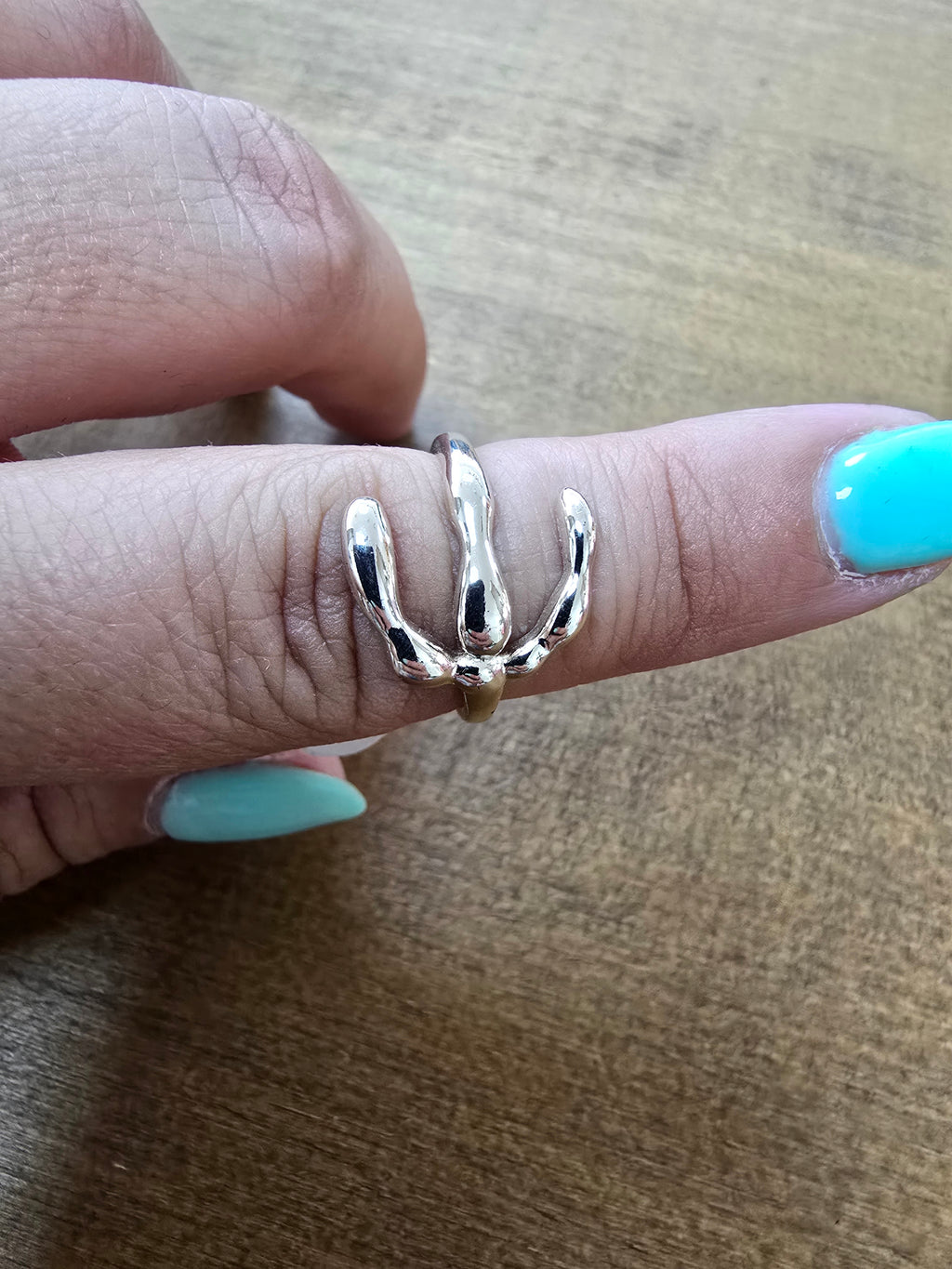 Anillo Tridente